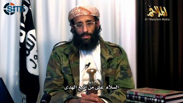 This video grab image released on December 20, 2011 by SITE  Intelligence Group shows a clip  from Al-Qaeda in the Arabian Peninsula (AQAP)  focusing on slain Yemeni-American cleric Anwar al-Awlaki,  and featuring footage of a speech from Awlaki to the American people and Muslims in the West.  The 33 minute, 16 second English-subtitled video, titled, The Martyr of Daawah (Call), was posted on jihadist forums on December 20, 201 - Sputnik International