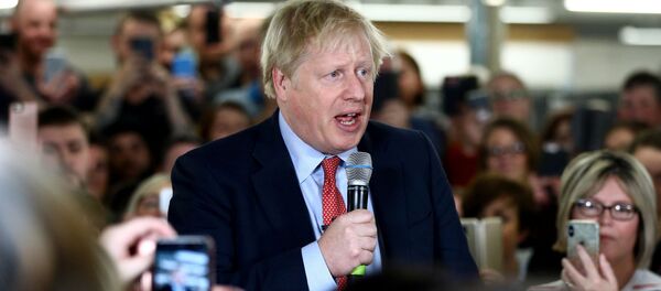 Britain's Prime Minister Boris Johnson delivers a speech to workers during a Conservative Party general election campaign visit to John Smedley Mill in Matlock, central England, on December 5, 2019. Britain's Prime Minister Boris Johnson delivers a speech to workers during a Conservative Party general election campaign visit to John Smedley Mill in Matlock, central England, on December 5, 2019. - Sputnik International