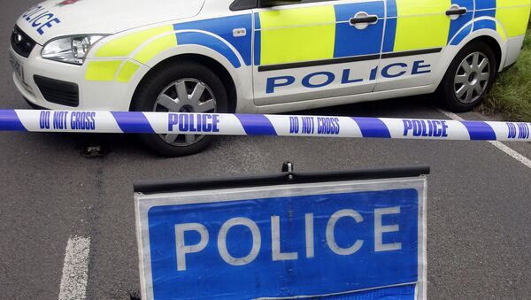 Police close off a road near Chertsey in Surrey, southern England - Sputnik International