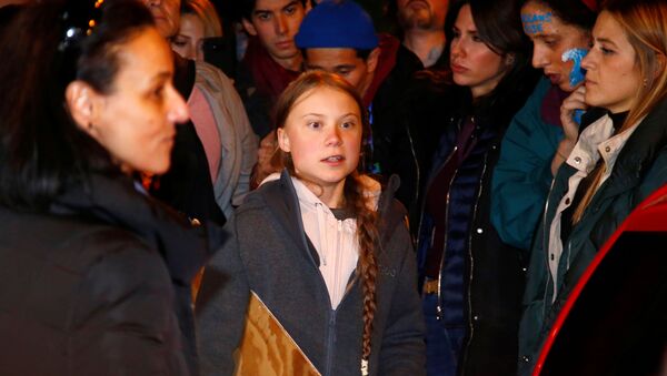 Climate change activist Greta Thunberg is seen before departing a climate change protest march due to security concerns, as COP25 climate summit is held in Madrid, Spain, December 6, 2019. - Sputnik International