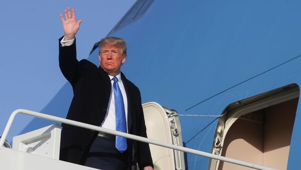 U.S. President Donald Trump waves as he boards Air Force One to depart Washington for a day and evening trip to Florida from Joint Base Andrews, Maryland, US, 7 December 2019. - Sputnik International