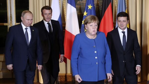   French President Emmanuel Macron, second left, Russian President Vladimir Putin, left, German Chancellor Angela Merkel and Ukrainian President Volodymyr Zelenskiy arrive for a working session at the Elysee Palace Monday, Dec. 9, 2019 in Paris. Russian President Vladimir Putin and Ukraine's president are meeting for the first time at a summit in Paris to find a way to end the five years of fighting in eastern Ukraine. (AP Photo/Thibault Camus, Pool) - Sputnik International