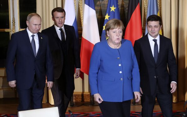   French President Emmanuel Macron, second left, Russian President Vladimir Putin, left, German Chancellor Angela Merkel and Ukrainian President Volodymyr Zelenskiy arrive for a working session at the Elysee Palace Monday, Dec. 9, 2019 in Paris. Russian President Vladimir Putin and Ukraine's president are meeting for the first time at a summit in Paris to find a way to end the five years of fighting in eastern Ukraine. (AP Photo/Thibault Camus, Pool) - Sputnik International