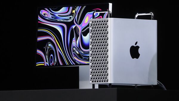 In this June 3, 2019, file photo, Apple CEO Tim Cook speaks about the Mac Pro at the Apple Worldwide Developers Conference in San Jose, Calif. Apple announced Monday, Sept. 23, it will continue manufacturing its Mac Pro computers in Texas after the Trump administration approved its request to waive tariffs on certain parts from China. - Sputnik International