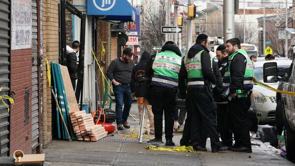 A demolition and recovery crew works at the scene of the December 10, 2019 shooting at a Jewish Deli on December 11, 2019 in Jersey City.  - Sputnik International