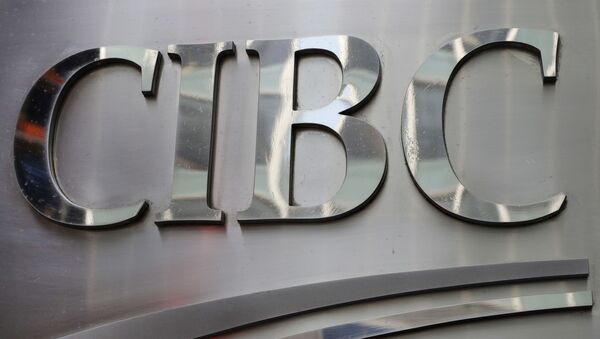 A sign for CIBC, the Canadian Imperial Bank of Commerce, is posted outside the bank's New York office, Thursday, May 4, 2018. - Sputnik International
