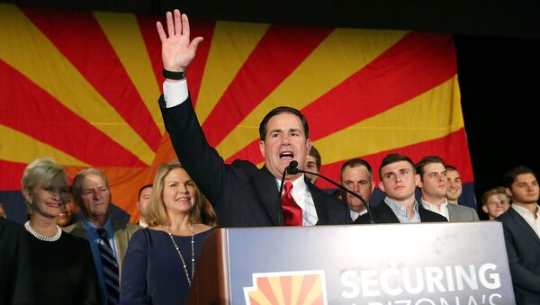 Republican Gov. Doug Ducey celebrates his victory at an election night event for Arizona GOP candidates on 6 November 2018 in Scottsdale, Arizona. Ducey defeated Democratic challenger David Garcia - Sputnik International