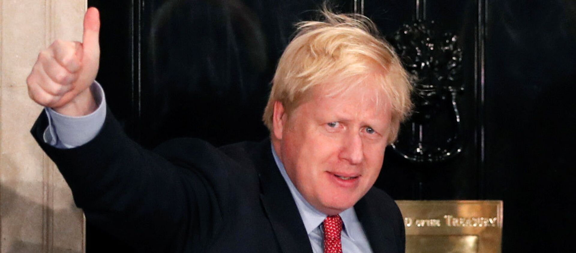 Britain's Prime Minister Boris Johnson gestures as he arrives at 10 Downing Street on the morning after the general election in London, Britain, December 13, 2019 - Sputnik International, 1920, 28.12.2019