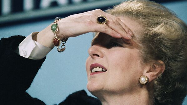 Britain's Prime Minister Margaret Thatcher peers out over her audience during press conference, June 10, 1987 in central London. - Sputnik International