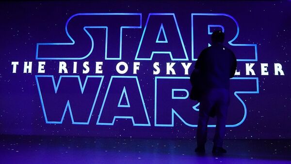 A man watches a trailer for Star Wars: The Rise of Skywalker at the Dolby store in the Manhattan borough of New York City, 5 December 2019. - Sputnik International