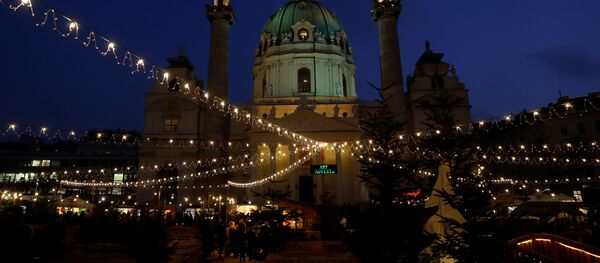 A Christmas market is pictured in front of Karslkirche in Vienna, Austria December 4, 2019 A Christmas market is pictured in front of Karslkirche in Vienna, Austria December 4, 2019 - Sputnik International