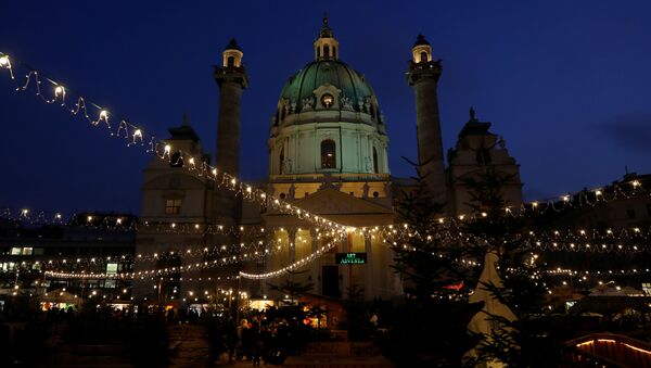 A Christmas market is pictured in front of Karslkirche in Vienna, Austria December 4, 2019 - Sputnik International