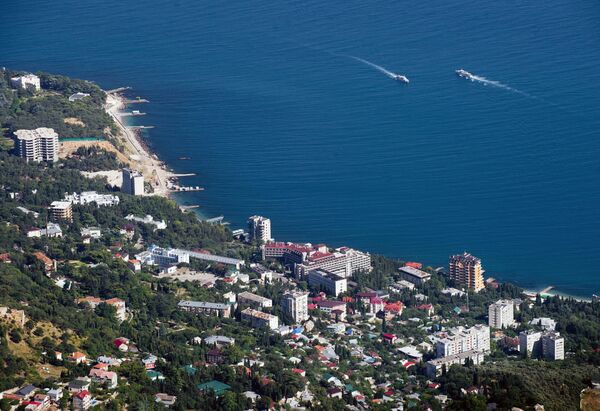 View of the Black Sea shore and Miskhor village from Ai-Petri Mountain in Crimea - Sputnik International