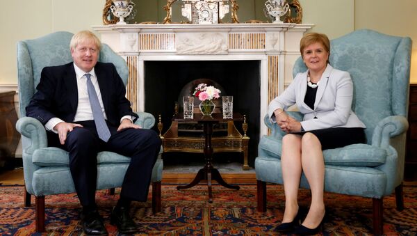Britain's Prime Minister Boris Johnson poses for a photograph with Scotland's First Minister Nicola Sturgeon at Bute House in Edinburgh, Britain, July 29, 2019 - Sputnik International