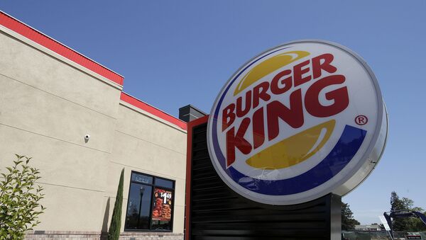 his April 25, 2019, file photo shows a Burger King in Redwood City, Calif. Burger King is introducing a plant-based burger in Europe. But it's not the Impossible Whopper that's been a hit with U.S. customers. Instead, a Dutch company called The Vegetarian Butcher will supply the new soy-based Rebel Whopper. It will go on sale Tuesday, Nov. 12, at 2,400 restaurants across Europe.  - Sputnik International