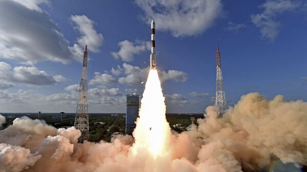 This handout photo provided by the Indian Space Research Organization shows PSLV-C48 lifting off at the Satish Dhawan Space Center in Sriharikota, India, Wednesday, Dec. 11, 2019. India’s Polar Satellite Launch Vehicle successfully launched RISAT-2BR1 along with nine commercial satellites, according to a press release. RISAT-2BR1 is a radar imaging earth observation satellite weighing about 628 kg, it said - Sputnik International