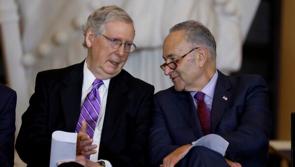 Senate Majority Leader Mitch McConnell and Senate Minority Leader Chuck Schumer talk during a ceremony to present the Congressional Gold Medal to Filipino veterans of the Second World War on Capitol Hill in Washington, U.S., October 25, 2017 - Sputnik International