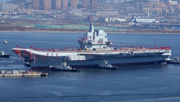 Type 001A, China's second aircraft carrier, is transferred from the dry dock into the water during a launch ceremony at Dalian shipyard in Dalian, northeast China's Liaoning Province, April 26, 2017 - Sputnik International