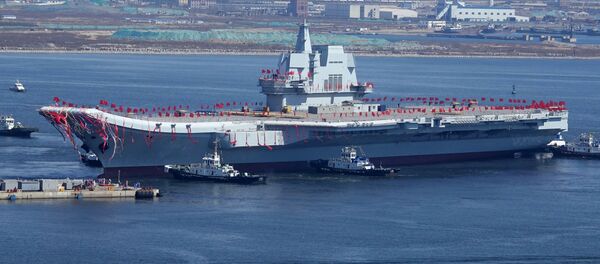 Type 001A, China's second aircraft carrier, is transferred from the dry dock into the water during a launch ceremony at Dalian shipyard in Dalian, northeast China's Liaoning Province, April 26, 2017 - Sputnik International