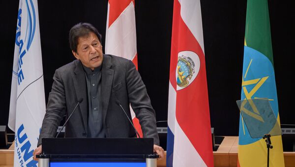 Pakistan's Prime Minister Imran Khan delivers a speech during the opening of the Global Refugee Forum, on December 17, 2019 in Geneva - Sputnik International