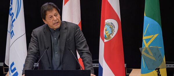 Pakistan's Prime Minister Imran Khan delivers a speech during the opening of the Global Refugee Forum, on December 17, 2019 in Geneva - Sputnik International