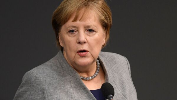 German Chancellor Angela Merkel attends a session of lower house of parliament, the Bundestag, in Berlin, Germany, December 18, 2019 - Sputnik International