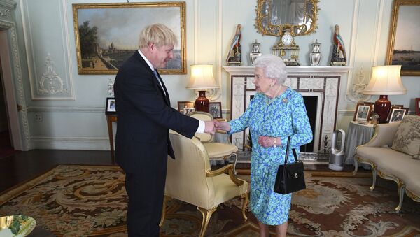 Britain's Queen Elizabeth II welcomes newly elected leader of the Conservative party Boris Johnson during an audience at Buckingham Palace, London, 24 July 2019, where she invited him to become Prime Minister and form a new government. - Sputnik International