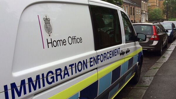 A British government Home Office van is seen parked in west London, Britain - Sputnik International