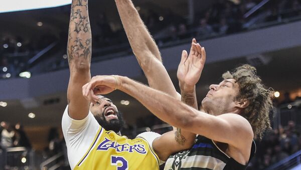 Los Angeles Lakers forward Anthony Davis (3) shoots over Milwaukee Bucks center Robin Lopez (42) in the fourth quarter at Fiserv Forum in Milwaukee, Wisconsin.  - Sputnik International