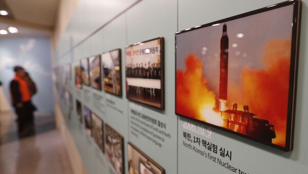 In this Friday, Dec. 13, 2019, photo, an image showing North Korea's missile launch is displayed at the Unification Observation Post in Paju, South Korea, near the border with North Korea - Sputnik International