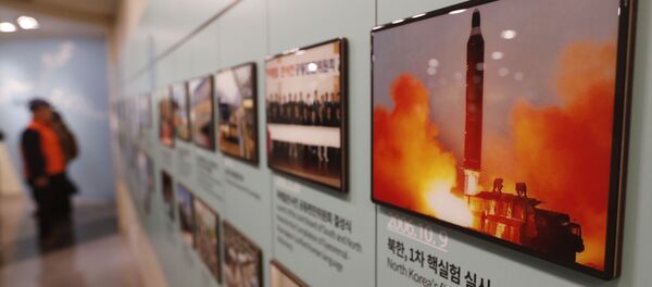 In this Friday, Dec. 13, 2019, photo, an image showing North Korea's missile launch is displayed at the Unification Observation Post in Paju, South Korea, near the border with North Korea In this Friday, Dec. 13, 2019, photo, an image showing North Korea's missile launch is displayed at the Unification Observation Post in Paju, South Korea, near the border with North Korea - Sputnik International
