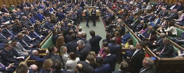 Lawmakers await the result of the vote on The European Union (Withdrawal Agreement) Bill in the House of Commons in London, Friday Dec. 20, 2019. British lawmakers approved in principle Prime Minister Boris Johnson’s Brexit bill, clearing the way for the U.K. to leave the European Union next month. The House of Commons voted 358-234 on Friday for the Withdrawal Agreement Bill. Lawmakers await the result of the vote on The European Union (Withdrawal Agreement) Bill in the House of Commons in London, Friday Dec. 20, 2019. British lawmakers approved in principle Prime Minister Boris Johnson’s Brexit bill, clearing the way for the U.K. to leave the European Union next month. The House of Commons voted 358-234 on Friday for the Withdrawal Agreement Bill. - Sputnik International