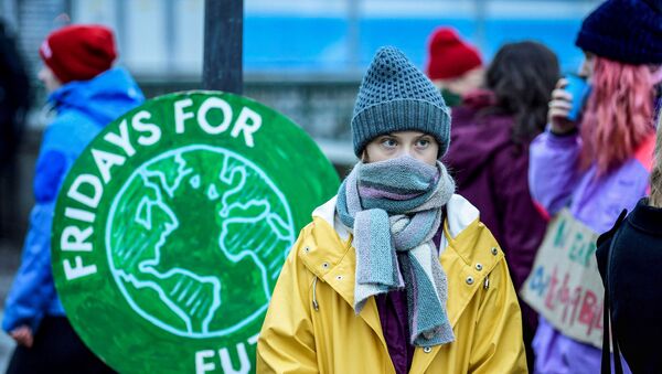 Swedish environmental activist Greta Thunberg attends a climate strike of the Fridays For Future movement outside the Swedish parliament Riksdagen in Stockholm, December 20, 2019.  - Sputnik International