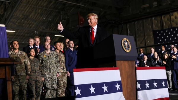 U.S. President Donald Trump gives a thumbs up at a signing ceremony on the National Defense Authorization Act for Fiscal Year 2020 at Joint Base Andrews, Maryland, U.S. December 20, 2019. - Sputnik International