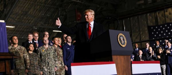 U.S. President Donald Trump gives a thumbs up at a signing ceremony on the National Defense Authorization Act for Fiscal Year 2020 at Joint Base Andrews, Maryland, U.S. December 20, 2019. - Sputnik International