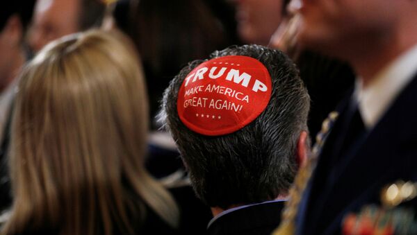 A participant wears a Trump Make America Great Again yarmulke as they attend a White House Hanukkah reception - Sputnik International