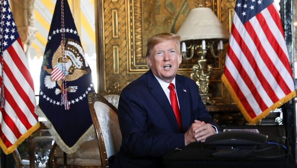 U.S. President Donald Trump speaks to the media after participating in a video teleconference with members of the U.S. military at Trump's Mar-a-Lago resort in Palm Beach, Florida, U.S., December 24, 2019 - Sputnik International