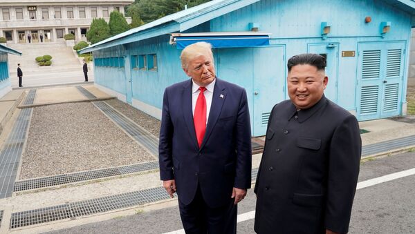 U.S. President Donald Trump meets with North Korean leader Kim Jong Un at the demilitarized zone separating the two Koreas, in Panmunjom, South Korea, June 30, 2019 - Sputnik International
