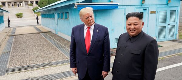 U.S. President Donald Trump meets with North Korean leader Kim Jong Un at the demilitarized zone separating the two Koreas, in Panmunjom, South Korea, June 30, 2019 - Sputnik International