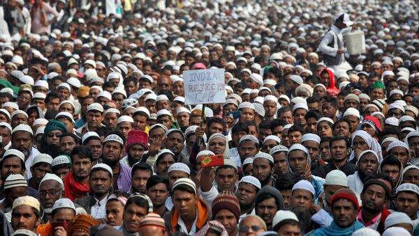 People attend a protest, organised by West Bengal State Jamiat-e-Ulama, an Islamic organisation that is opposed to the new citizenship law, in Kolkata, India, 22 December 2019.  - Sputnik International