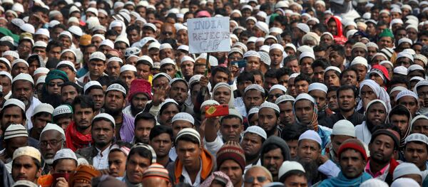 People attend a protest, organised by West Bengal State Jamiat-e-Ulama, an Islamic organisation that is opposed to the new citizenship law, in Kolkata, India, 22 December 2019. People attend a protest, organised by West Bengal State Jamiat-e-Ulama, an Islamic organisation that is opposed to the new citizenship law, in Kolkata, India, 22 December 2019. - Sputnik International