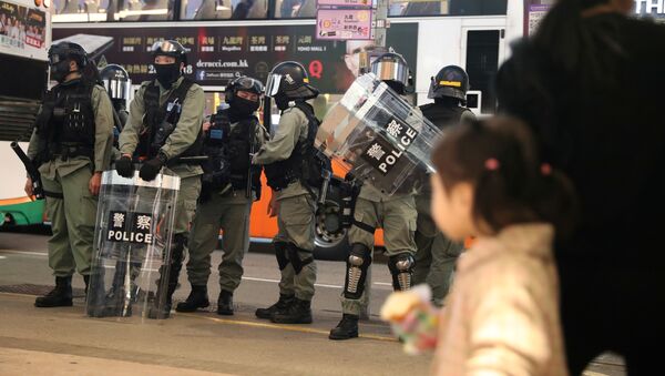 Riot police patrol outside Causeway Bay shopping mall in Hong Kong - Sputnik International