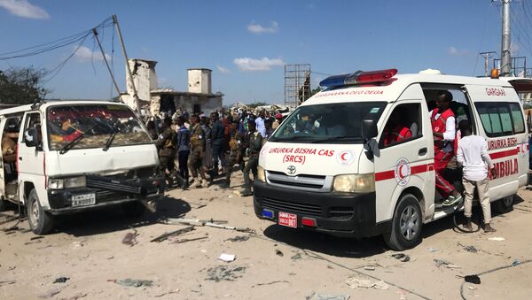 An ambulance leaves from the scene of a car bomb explosion at a checkpoint in Mogadishu, Somalia  December 28, 2019. REUTERS/Feisal Omar - Sputnik International