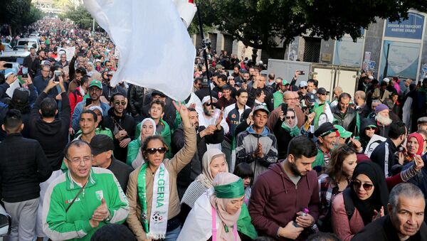 Demonstrators shout slogans during an anti-government rally in Algiers, Algeria December 27, 2019. - Sputnik International