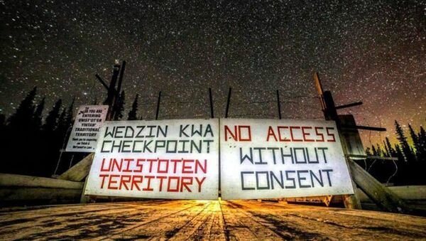 Blockade at the entrance to the Coastal GasLink pipeline, where Indigenous groups refuse to relinquish their land without consent.   - Sputnik International