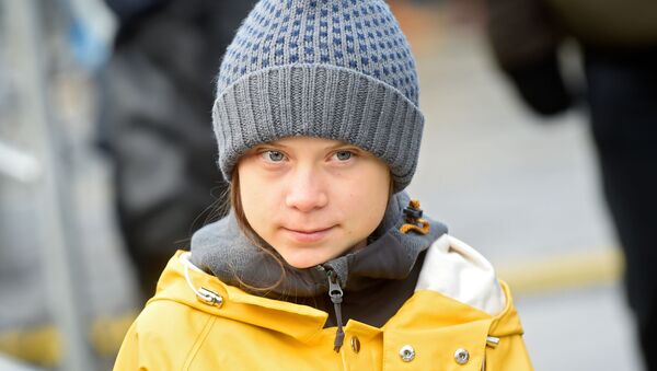 Climate change activist Greta Thunberg attends a news conference during a Fridays for Future protest in Turin, Italy December 13, 2019 - Sputnik International