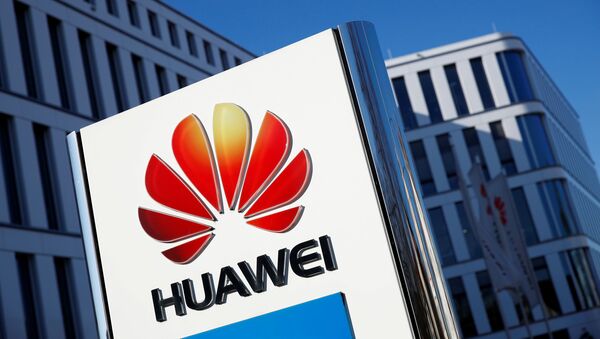 The logo of Huawei Technologies is pictured in front of the German headquarters of the Chinese telecommunications giant in Duesseldorf, Germany, February 18, 2019 - Sputnik International