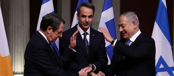 Cypriot President Nicos Anastasiades, Greek Prime Minister Kyriakos Mitsotakis and Israeli Prime Minister Benjamin Netanyahu pose for a photo before signing a deal to build the EastMed subsea pipeline to carry natural gas from the eastern Mediterranean to Europe, at the Zappeion Hall in Athens, Greece, January 2, 2020. Cypriot President Nicos Anastasiades, Greek Prime Minister Kyriakos Mitsotakis and Israeli Prime Minister Benjamin Netanyahu pose for a photo before signing a deal to build the EastMed subsea pipeline to carry natural gas from the eastern Mediterranean to Europe, at the Zappeion Hall in Athens, Greece, January 2, 2020. - Sputnik International
