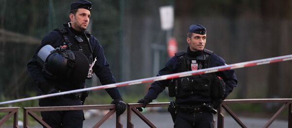 Riot police officers stand after a man attacked passerby Friday Jan.3, 2020 in Villejuif, south of Paris. A man armed with a knife rampaged through a Paris park attacking passers-by seemingly at random Friday, killing at least one person and injuring two others before police shot him dead, officials said. - Sputnik International