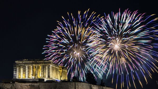 Fireworks explode over the ancient temple of the Parthenon on top of the Acropolis hill as part of Greece's celebrations for the New Year in Athens on January 1, 2020.  - Sputnik International